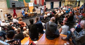 People watching performance at positive life event